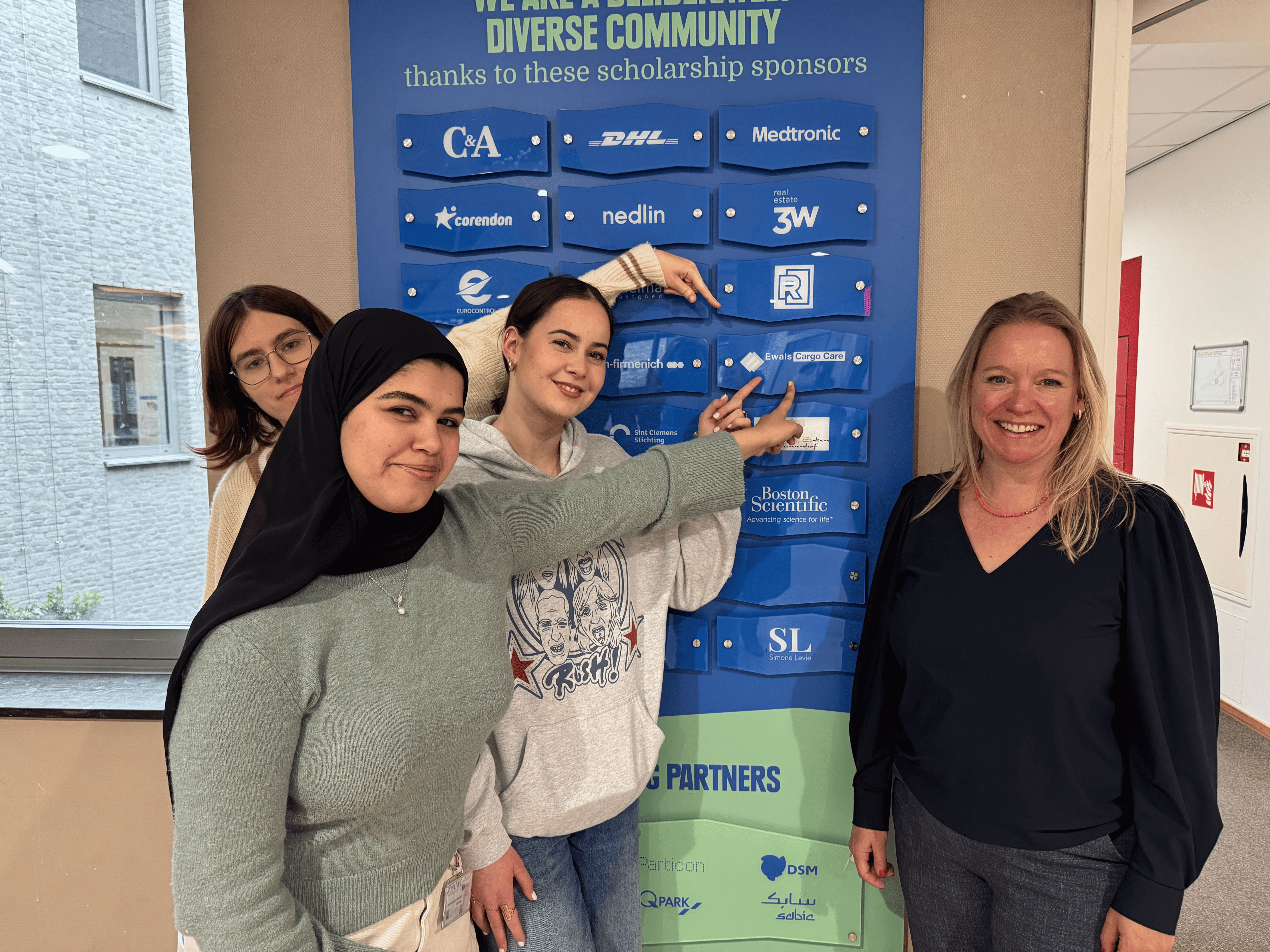 Debbie and students at UWCM